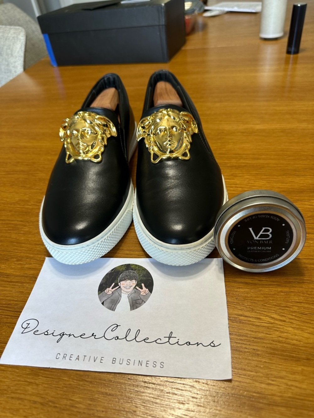 Versace Black Leather Slip-On Loafers with Gold Medusa Emblems